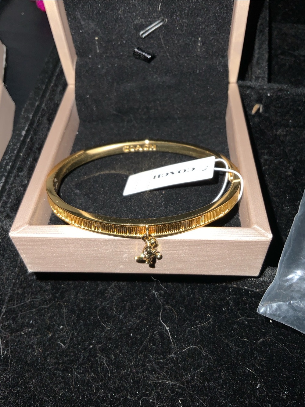 Coach Gold-Tone Textured Charm Bangle Bracelet